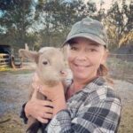jenny holding a ram lamb