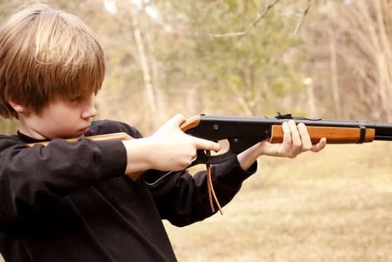 boy with a bb gun