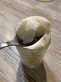 a jar and scoop of lard