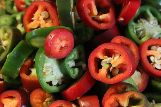 sliced red and green jalapenos