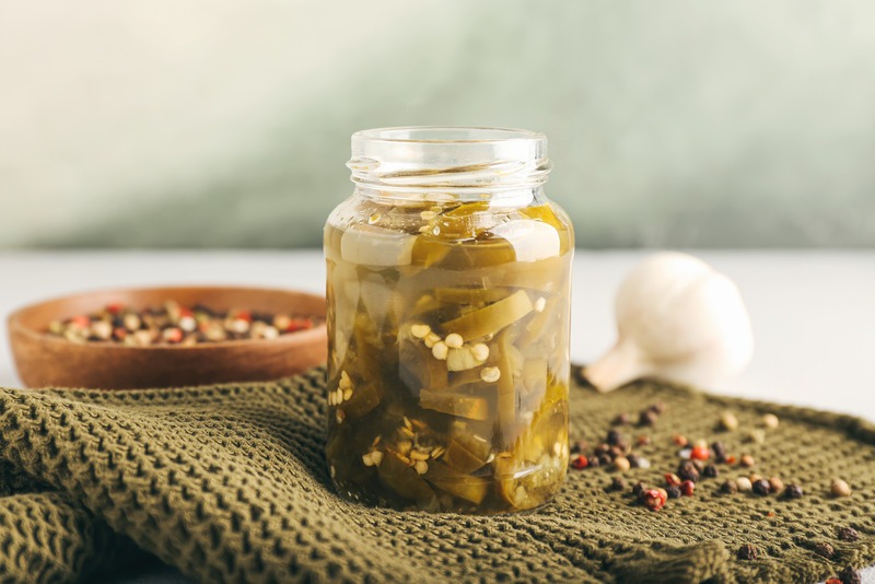 a-jar-of-pickled-jalapenos-with-spices