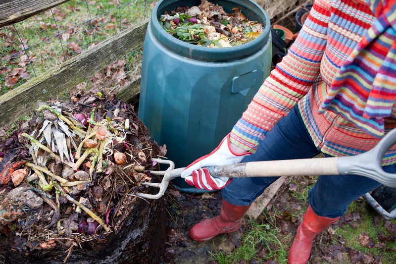 a woman composting