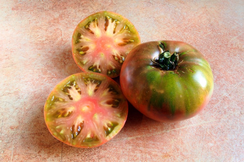 a sliced Cherokee purple tomato