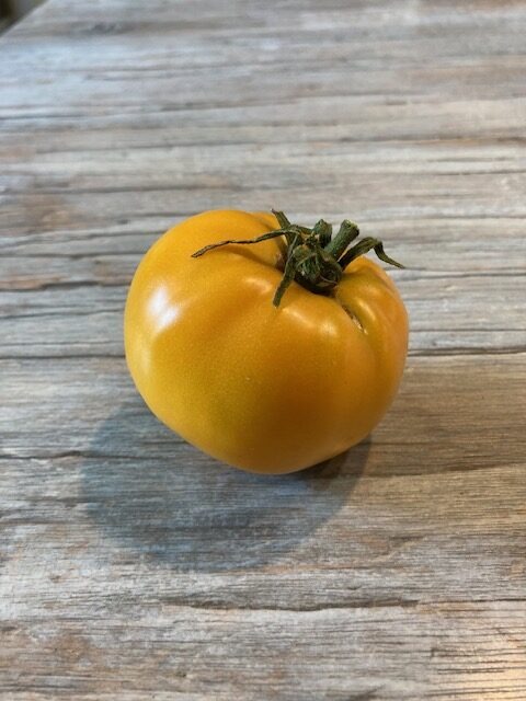 a fully ripened lemon boy tomato