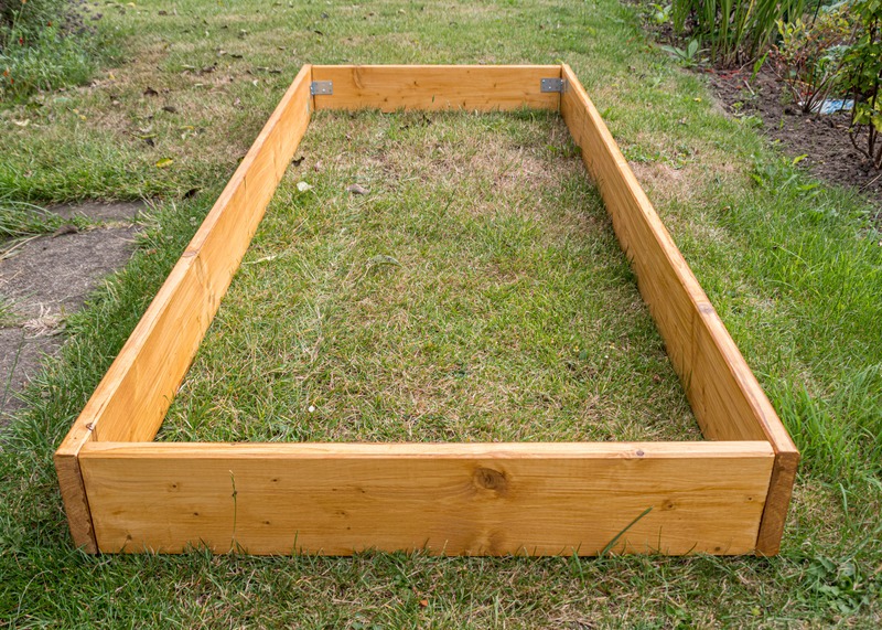 a newly built, empty raised bed