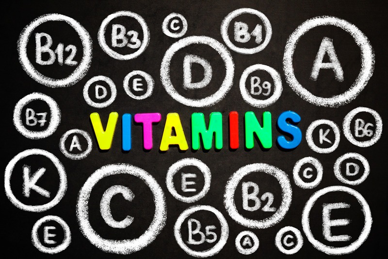 Vitamins concept on blackboard